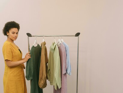 A fashion entrepreneur curates products where AI trend forecasting helps streamline decisions
