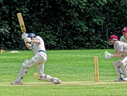 A June 2019 public Sunday match between Old Finchleians Cricket Club Friendly XI (batting) and Highgate Taverners Cricket Club 1st XI at Old Finchleians Memorial Ground in Woodside Park, Barnet, London, England