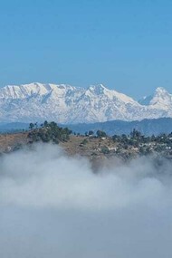Spectacular view of snow clad Himalayan peaks from Dhamas Village, India 