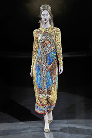 A model walks the runway at the Dolce & Gabbana fall 2013 ready-to-wear show in Milan, Italy