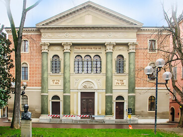 The building was designed by Ludovico Maglietta in 1873 and has a double façade in Via Coltellini and Piazza Mazzini. The Monumental Synagogue was built in the neighbourhood that originally comprised the city's ancient Jewish ghetto, Italy