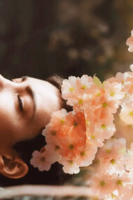 A woman practicing holotropic breathwork exercises