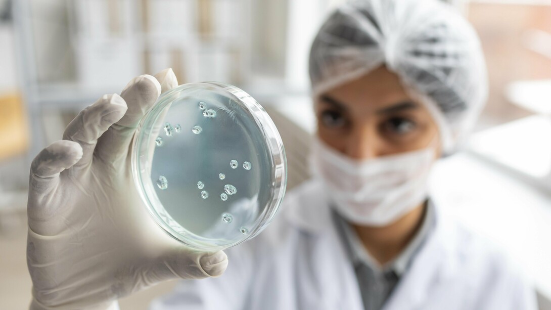 Modern tools allow researchers to uncover the hidden connections between microbes and cancer within the human body
