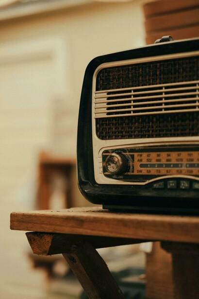 The café features a modern vintage radio that brings retro charm and nostalgic warmth