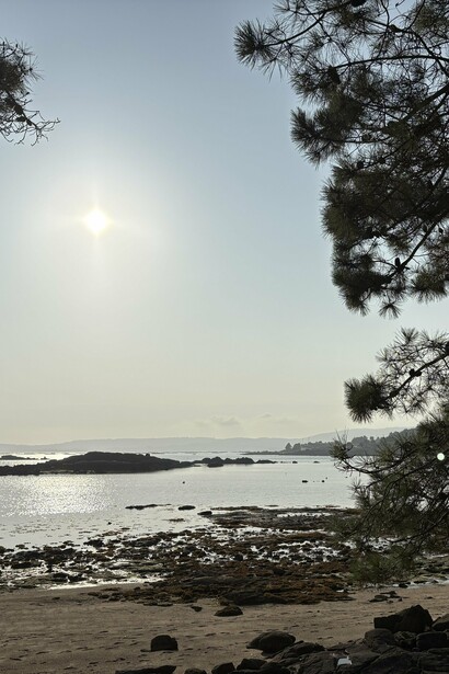 A peaceful sunrise on the Galician coast, where sea and sky meet in harmony © Photo by Noelle Newell