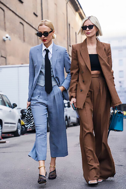 Guests attend the prestigious Milan Fashion Week, immersed in the latest trends and breathtaking designs showcased on the runway, Italy