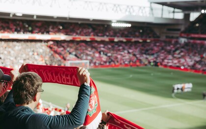 In Liverpool, England, United Kingdom, crowds gathered to watch the soccer game with passion and pride