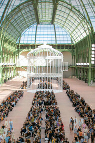 Chanel's Spring-Summer Ready-To-Wear Show held at the Grand Palais Museum in Paris, France, in the last week of September, 2024, showcasing a dazzling collection of soft blues, pinks, and yellows, along with the iconic white birdcage as the centrepiece