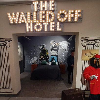 Full-sized reproduction of Banksy’s “The Walled Off Hotel,” created in
Bethlehem, West Bank — photograph by Quique Kierszenbaum/The Guardian. The
Walled Off Hotel is an immersive art installation and boutique hotel and originally
opened in March 2017. Credit: © Banksy / Pest Control Office