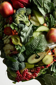 A human head filled with healthy foods and artificial intelligence, representing the fusion of functional foods and biohacking nutrition