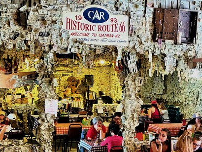 Patrons are invited to tack dollar bills on the walls and ceilings of the Oatman Hotel & Restaurant © Photo Jane Simon Ammeson