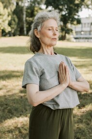 Woman breathing in a meditative pose