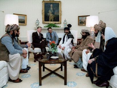 President Reagan publicizes his support by meeting with Afghan mujahideen leaders in the White House, 1983, USA