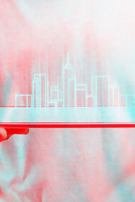 An architect using a transparent tablet to interact with smart construction technology, depicted with a double-color exposure effect, showcasing concepts such as digital twins in architecture