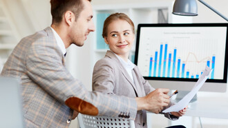 Two investors analyzing the markets outcomes to invest on startups 