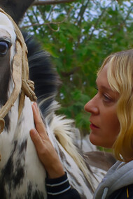 Magic Farm stars Chloë Sevigny as a woman drawn into the eerie beauty of a land where nature bends reality