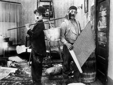 Charlie Chaplin in a scene from His New Job (1915), filmed in Los Angeles, USA