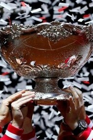Stanford University title in tennis being hoisted by the entire team