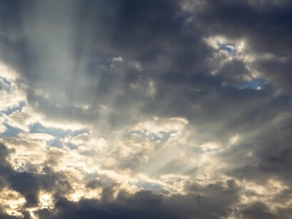 Like sunlight piercing storm clouds, it transforms struggle into meaning