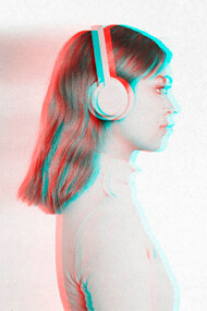 A woman with headphones, enhanced with an anaglyph effect for a 3D visual experience