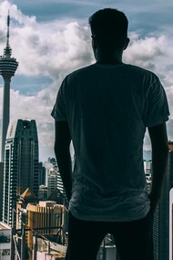 A man looking out in the capitalist world with the mantra of "every man for himself"