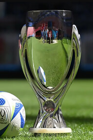 European Super Cup Final 2024 — the trophy placed on the pitch beside the match ball