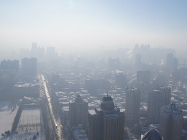 Smog blankets Chinese cities, a visible reminder of the tension between development and public health