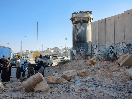 Monsieur Cana’s graffiti at the Qalandia checkpoint in Palestine