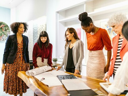 Women organizing community meetings and leading advocacy groups grounded in a human rights-based approach