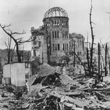 Photo of the building that would later become the Hiroshima Peace Memorial, standing amid the ruins of Hiroshima in early October 1945. Photograph by Shigeo Hayashi, Japan