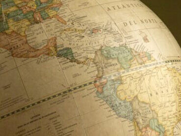 Maps, including world and globe representations, illustrate the power of naming, cartography, and the geopolitical dynamics that shape our understanding of space