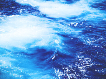 Bright blue waves caught in motion, conveying the gentle act of piecing together all your broken pieces into something whole again