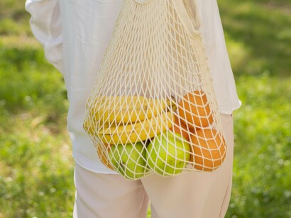 The weight of the bag is light, but it carries the memory of marketplaces now lost to time and conflict