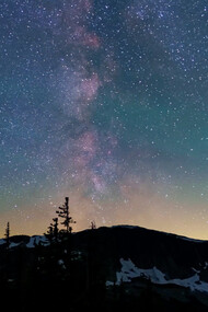 As the stars twinkle in the purple and blue evening sky, we are reminded of the transformative power of Pluto, urging us to evolve beyond traditional structures that no longer serve us