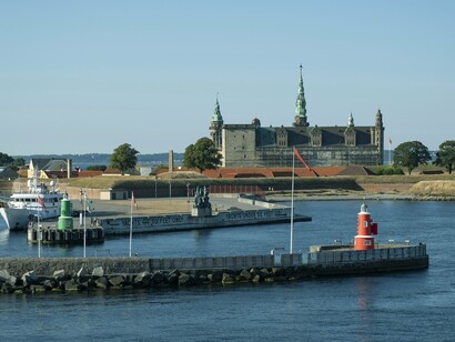 The harbor edge of Helsingør, a city defined as much by its proximity to the sea as by its literary and royal past