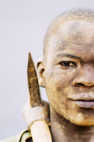 A miner’s face, covered in dirt, tells the story of long hours and hard labour in the pursuit of cobalt for global technology