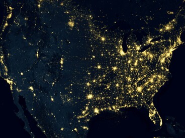 Night lights trace global connectivity, revealing economic intensity rather than human wellbeing