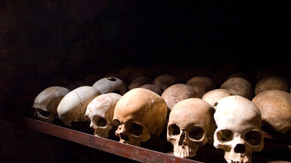 A collection of human skulls. This is part of a museum exhibit in Rwanda about the country's genocide