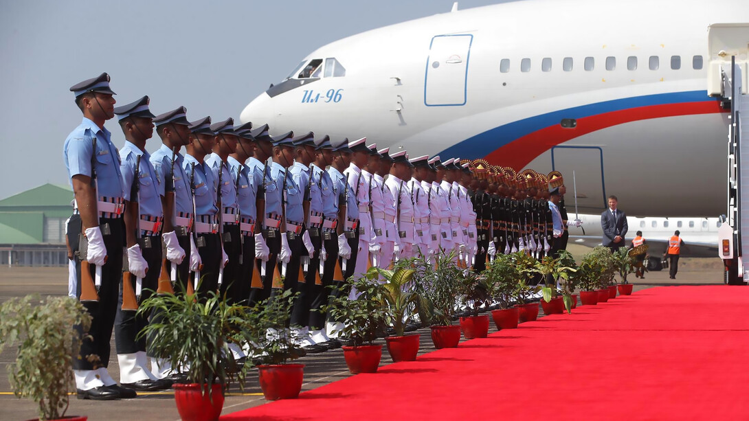 Russian President Vladimir Putin arrives in India aboard a Russian government aircraft, welcomed by Indian military personnel