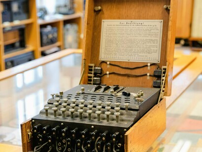 The mechanical roots of modern computation — secrecy, logic, and code