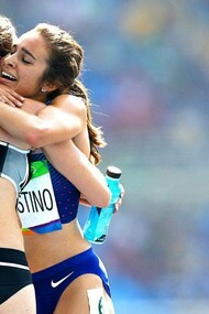 Kiwi Nikki Hamblin (left) and American Abbey D'Agostino thank each after a fall in the women's 5000m heats 