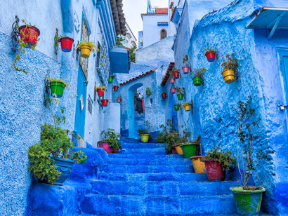 Morocco’s iconic blue alleyways, holding the steady resilience that persists beyond the Sahara conflict