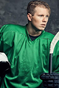 An ice hockey player with full equipment