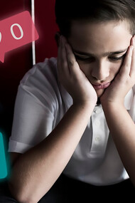 Teenager feeling frustrated by low engagement on social media