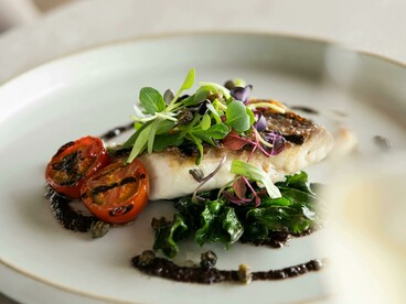 Gourmet Paleo-style fish and vegetable dish elegantly plated in Tokyo, Japan