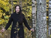 Marina in Black coat in the forest – Portrait of Marina Abramovic, © Knut Bry and Ekebergeparken Oslo, 2013