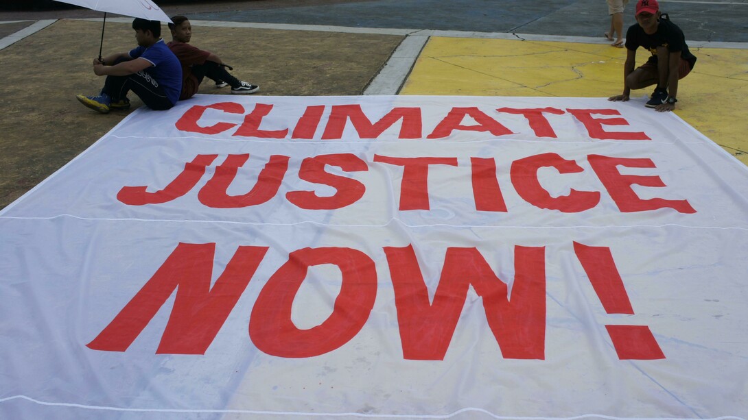 Young climate justice activists gather in the Philippines, highlighting how voices in the Global South are challenging unequal climate solutions and land control