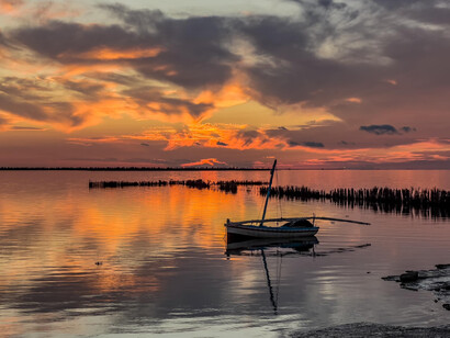 The fading light over Kerkennah captures the serene beauty of the Mediterranean, where the sea meets the sky in a timeless dance of color and light, image taken by Pierre Gassin