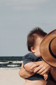 Father and son spending a day at the beach together, a blissful relationship