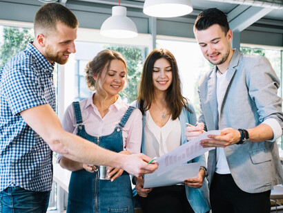 Colleagues engage in discussions about work plans, emphasizing the role of entrepreneurship, emotional resilience, and teamwork in overcoming business challenges as startup founders